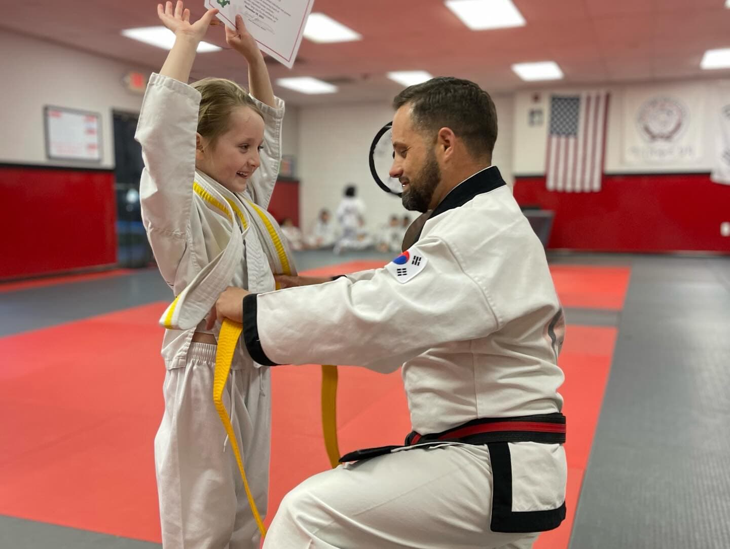 Coach Edward Stumm with his family at East Coast Karate in Glen Mills, PA