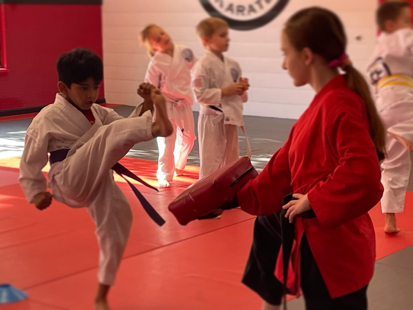 Young student training during a Little Dragons Martial Arts class at East Coast Karate